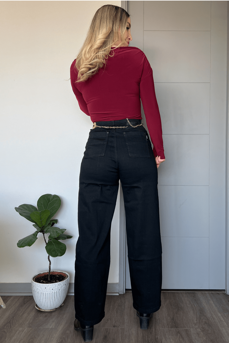 Jeans negro linea central recto