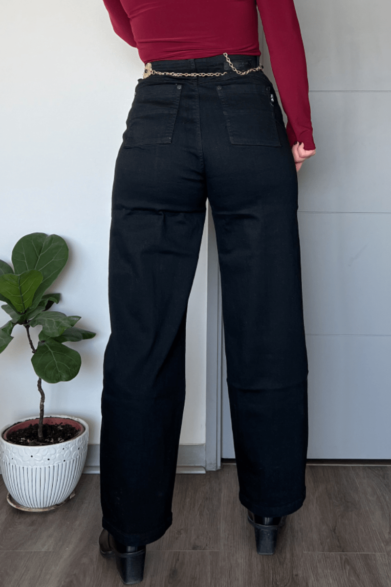 Jeans negro linea central recto