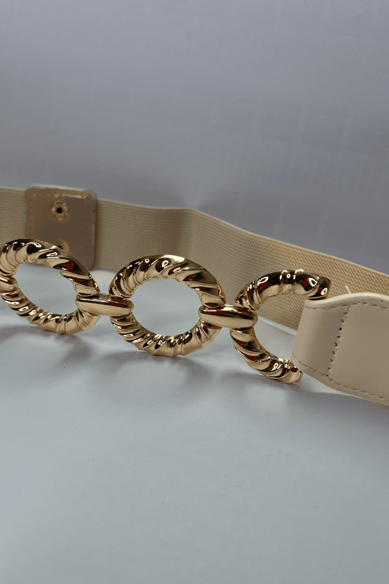 Cinturón hebillas circulares doradas elasticado eco cuero