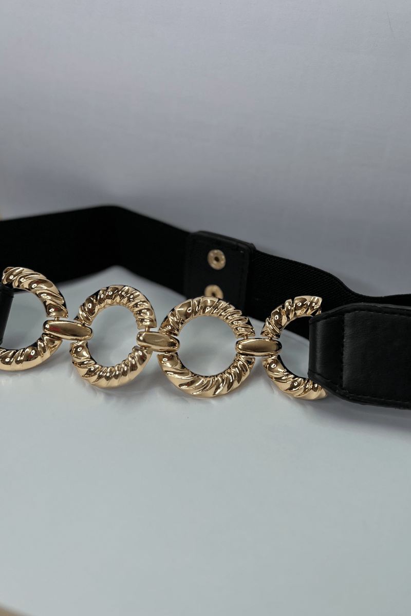 Cinturón hebillas circulares doradas elasticado eco cuero