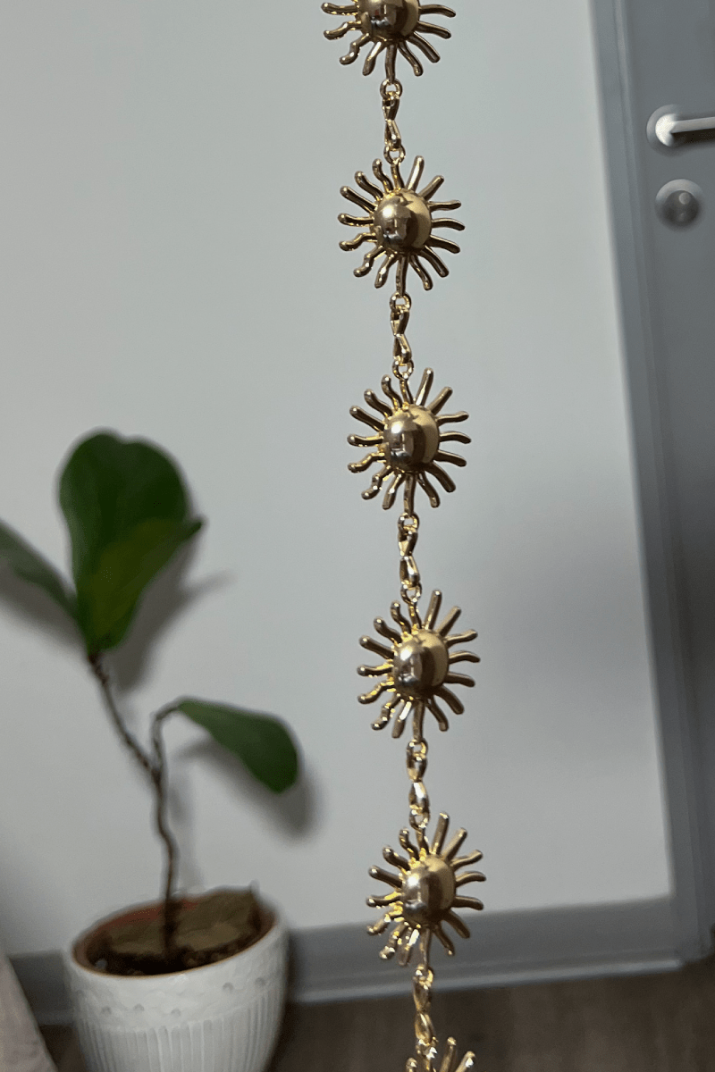 Cinturón metalico sol