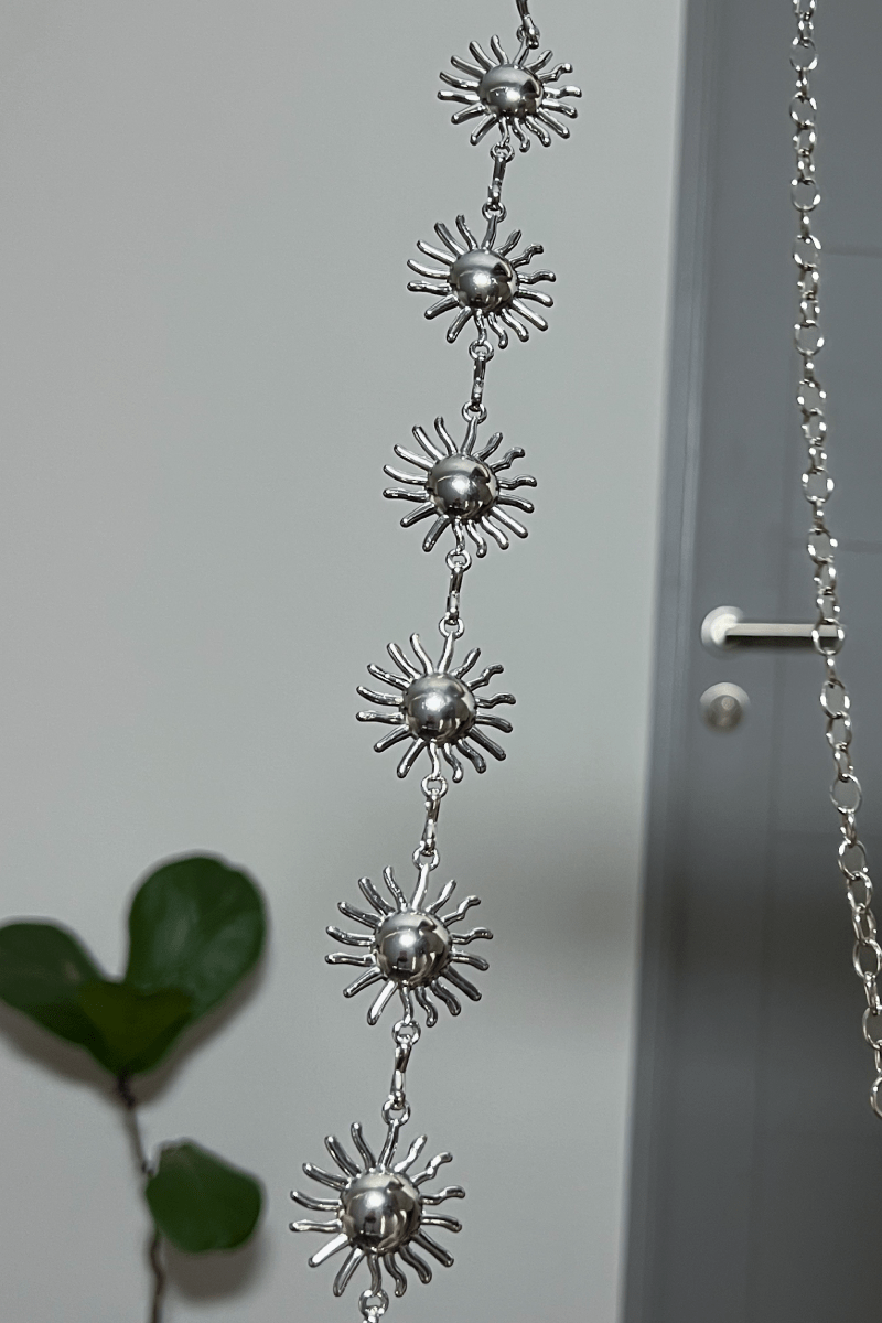 Cinturón metalico sol